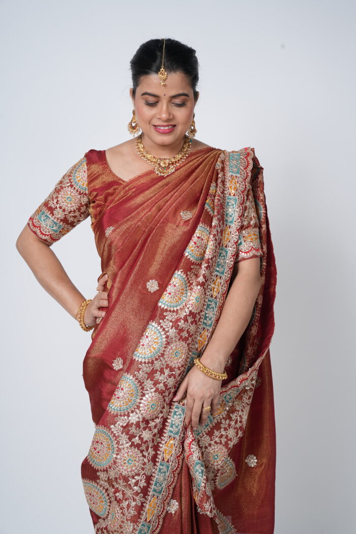 Rustic Orange Viscose Tissue Embroidered Saree
